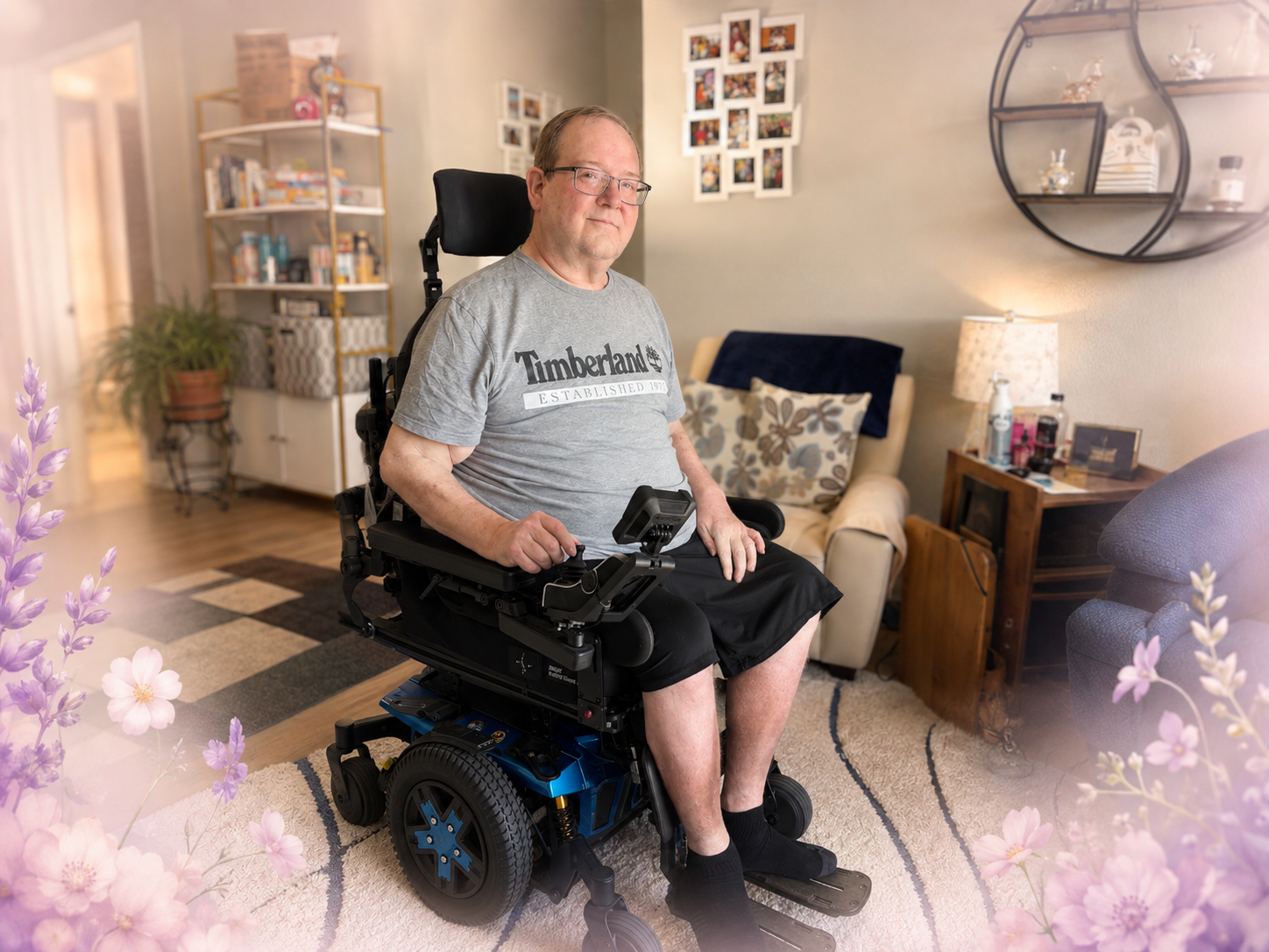 Randall seated in his power wheelchair at home